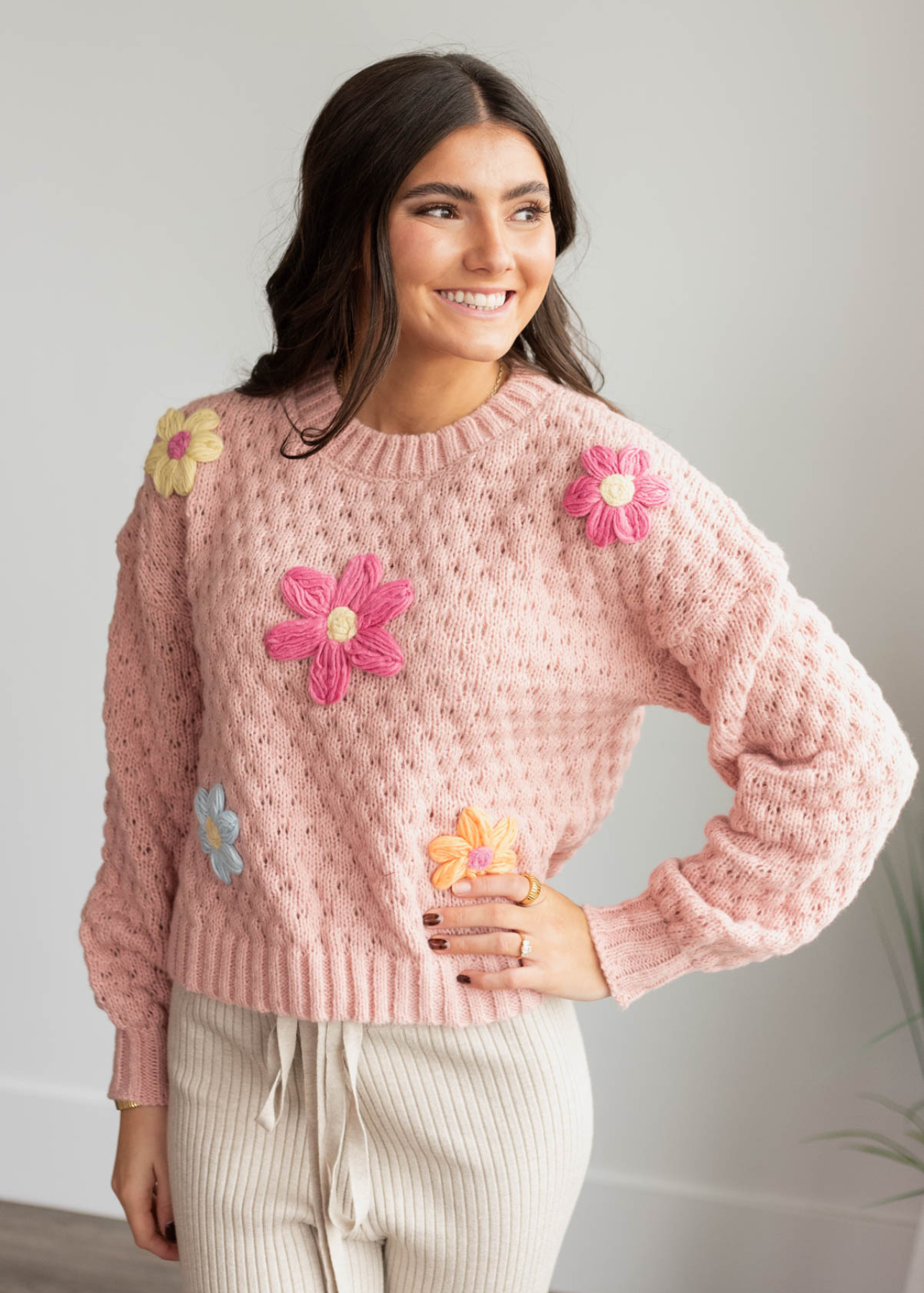 Blush knit flower sweater with long sleeves