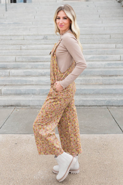 Side view of the marsala floral overalls