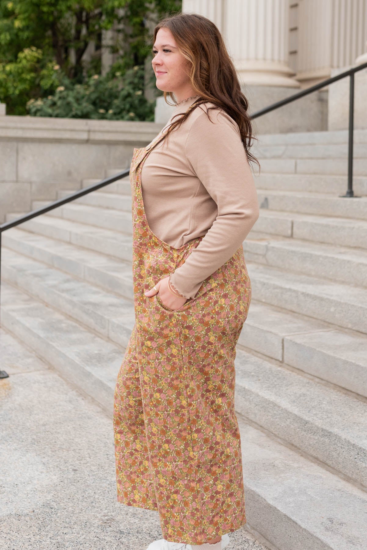 Side view of the marsala floral overalls