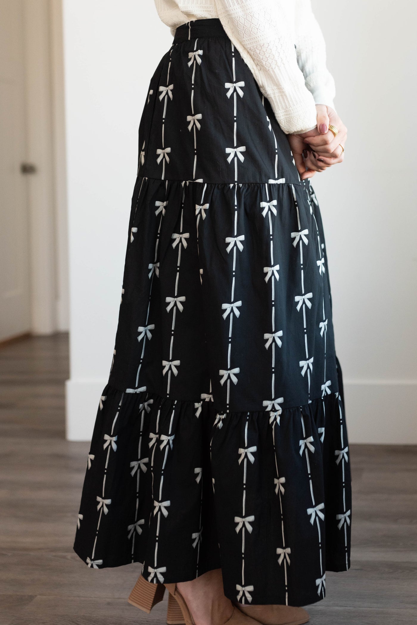 Black bow printed skirt with white bows