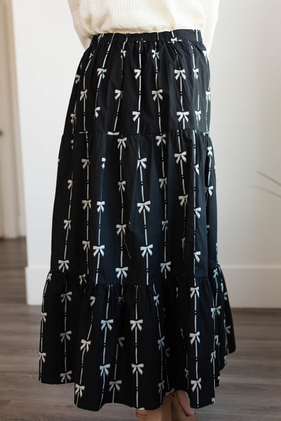 Back view of the black bow printed skirt