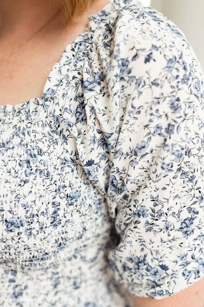 Blue floral dress.