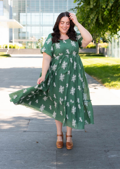 Emerald green embroidered dress with white flowers