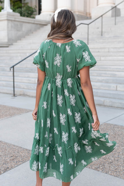 Back view of the emerald green embroidered dress