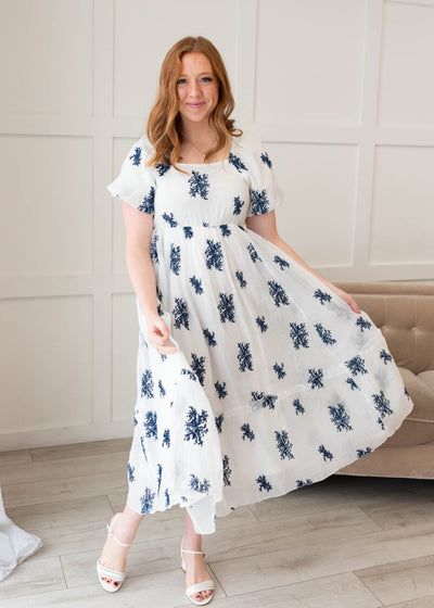 Ivory embroidered dress with navy embroidery and short sleeves