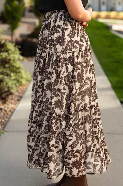 Side view of a brown floral skirt