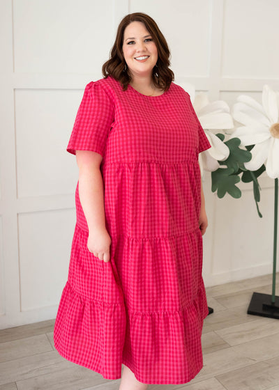 Short sleeve hot pink gingham tiered dress in plus size