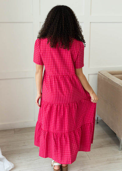 Back view of the hot pink gingham tiered dress