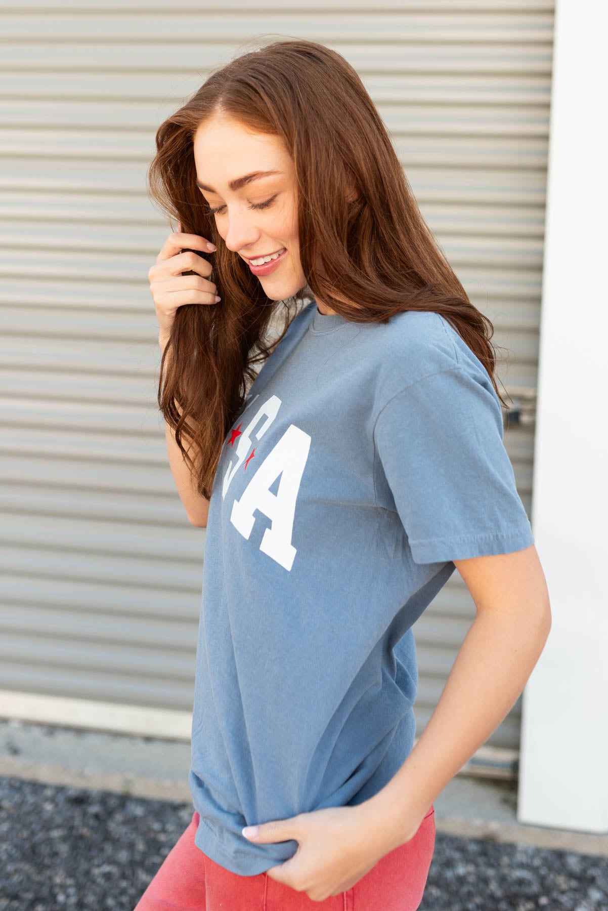 Side view of the blue USA star tee