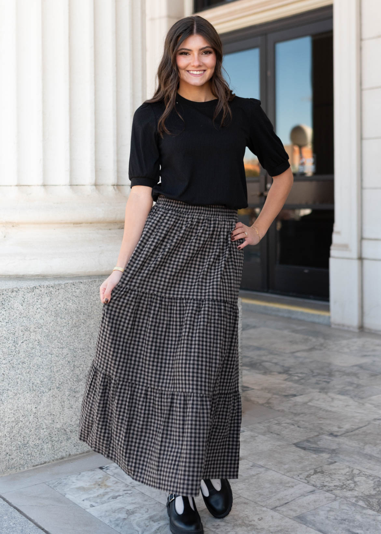 Elastic waist on the black gingham skirt