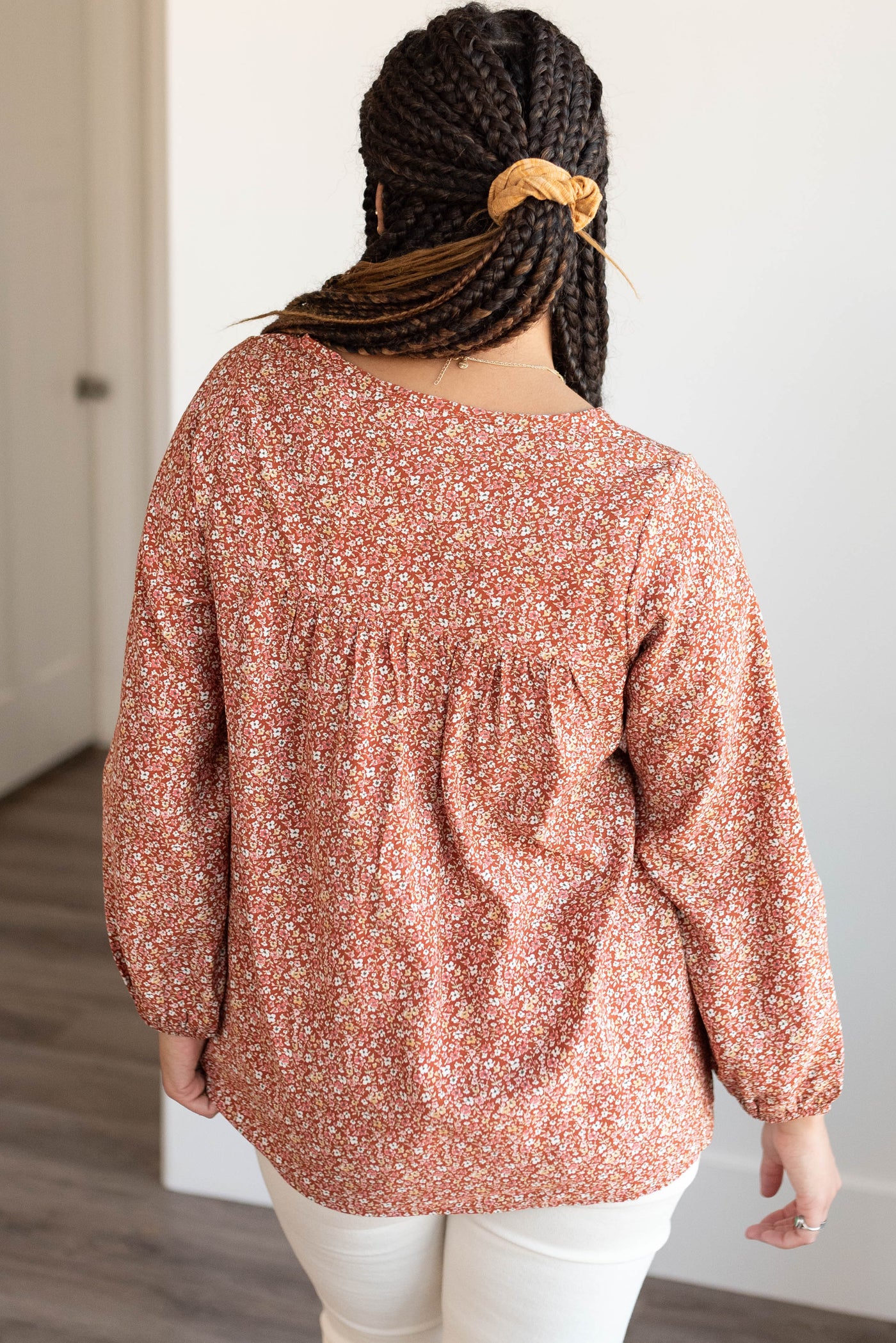 Back view of the rust floral top