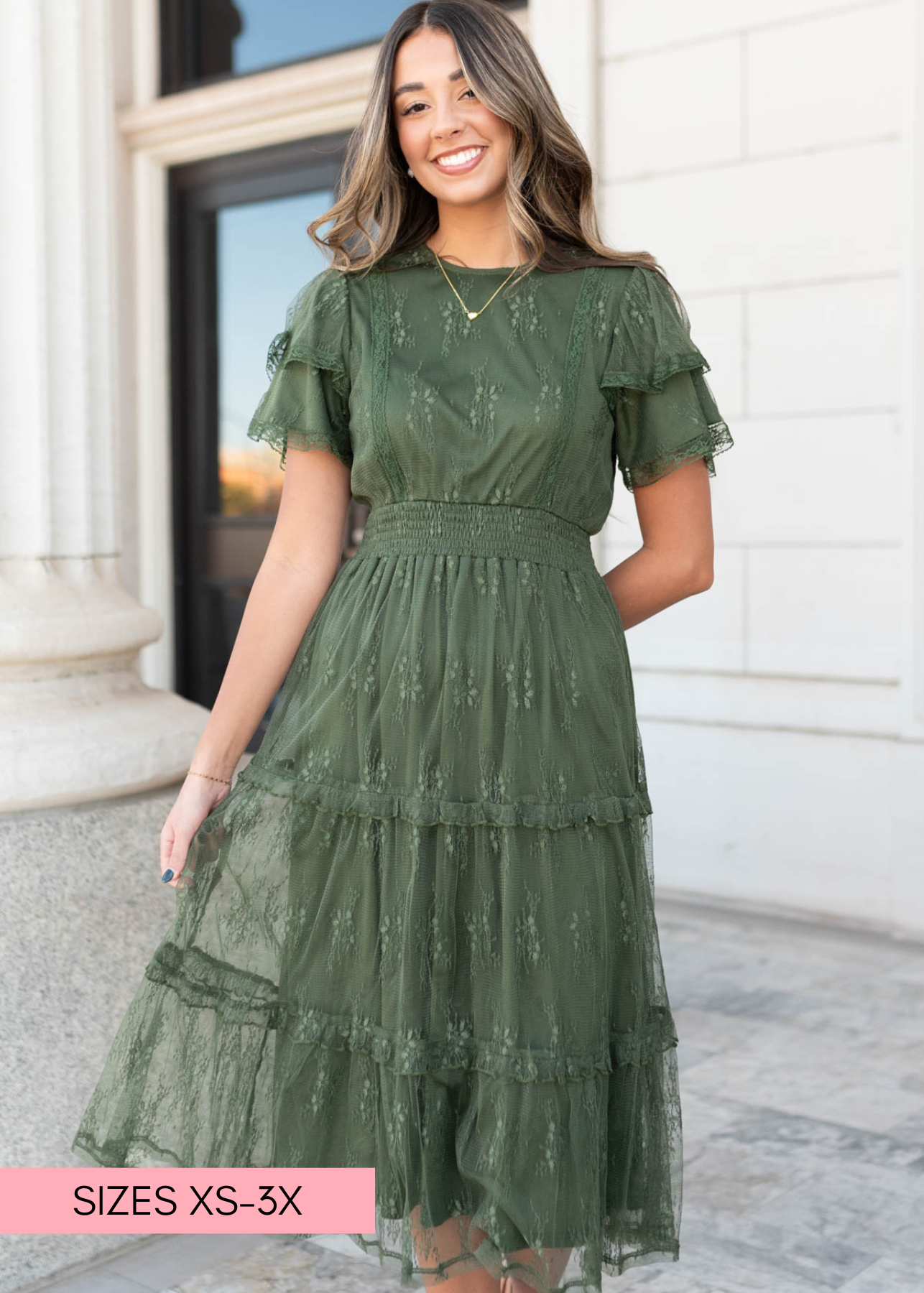 Front view of the dark green floral lace dress