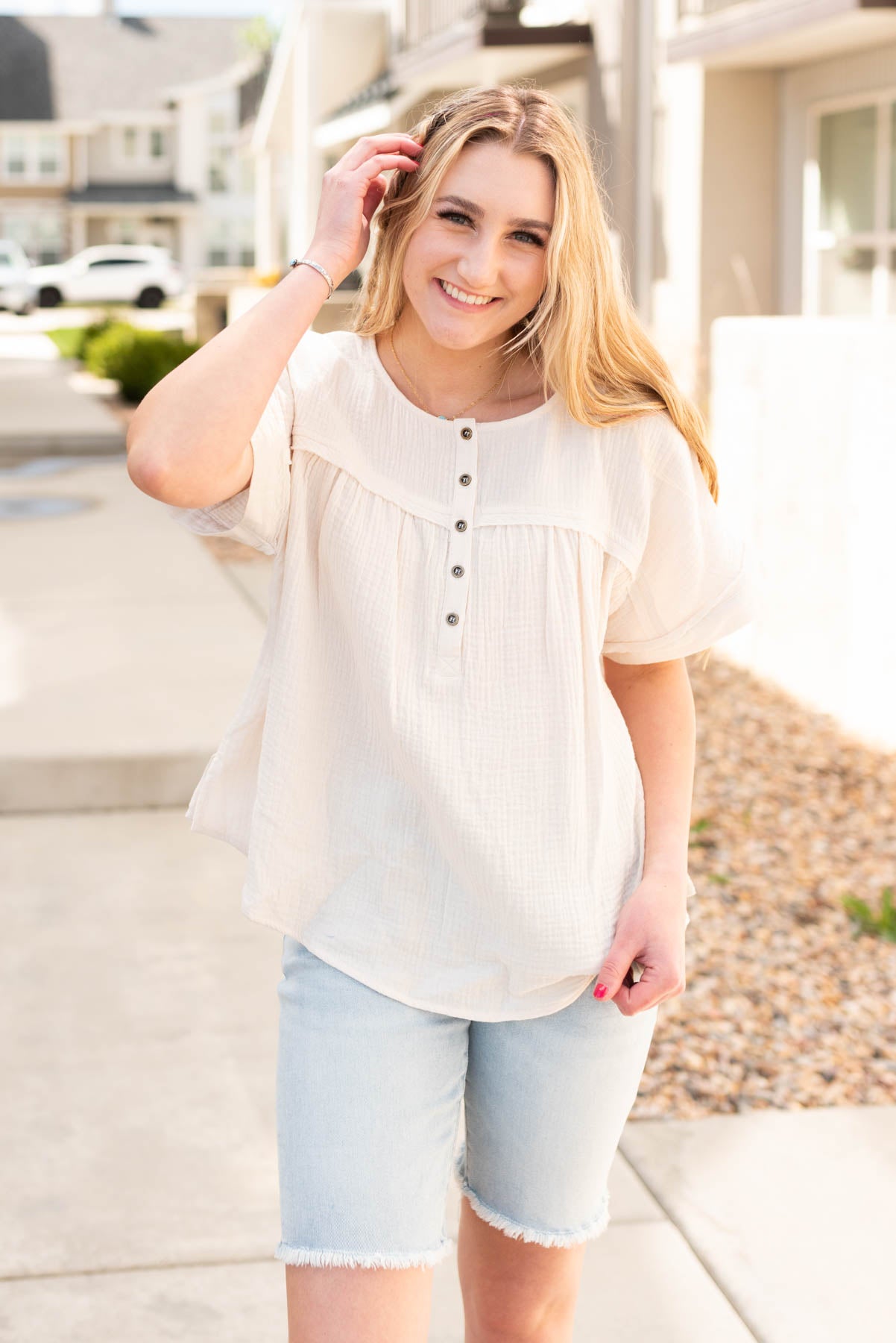 Cream button top with short sleeves