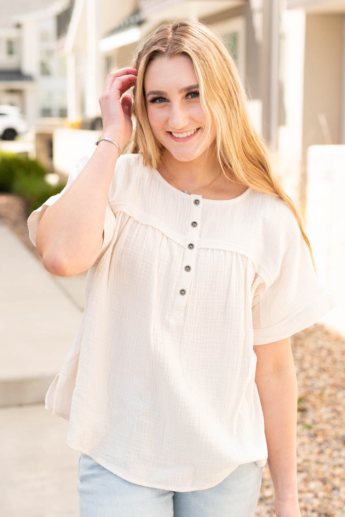 Short sleeve cream button top