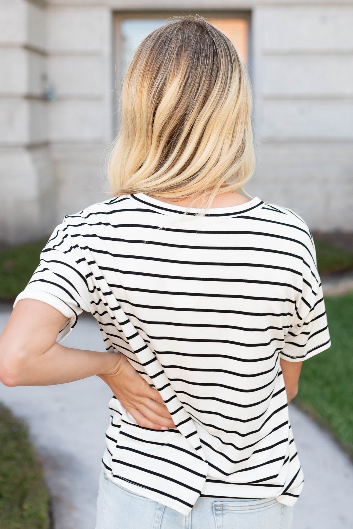 Back view of the ivory stripe oversize top