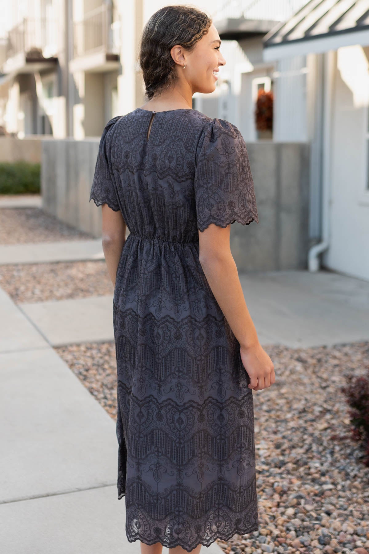 Back view of the charcoal embroidered dress