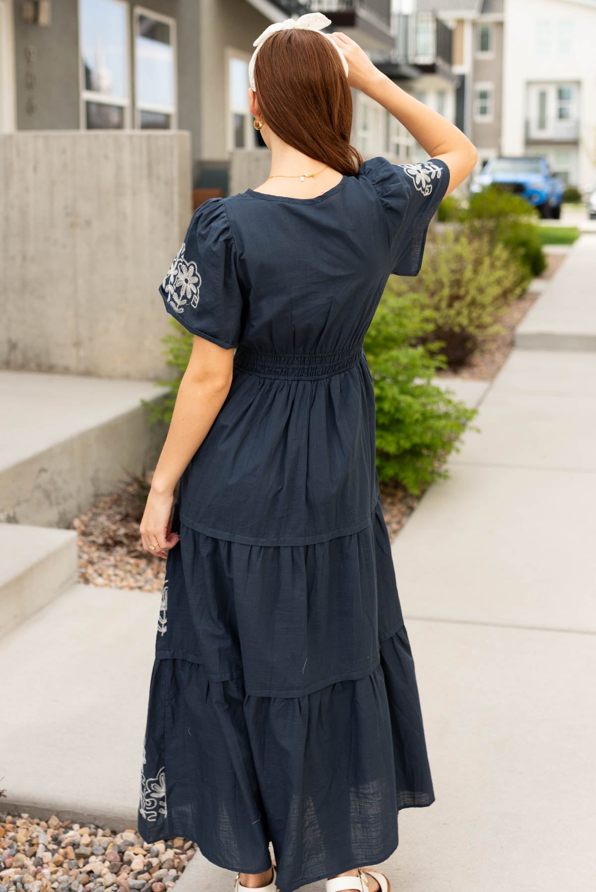 Back view of the navy embroidered detail dress