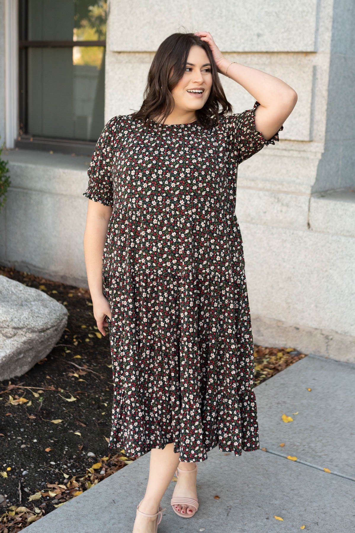 Plus size tiered floral dress with smocked bodice and short sleeves