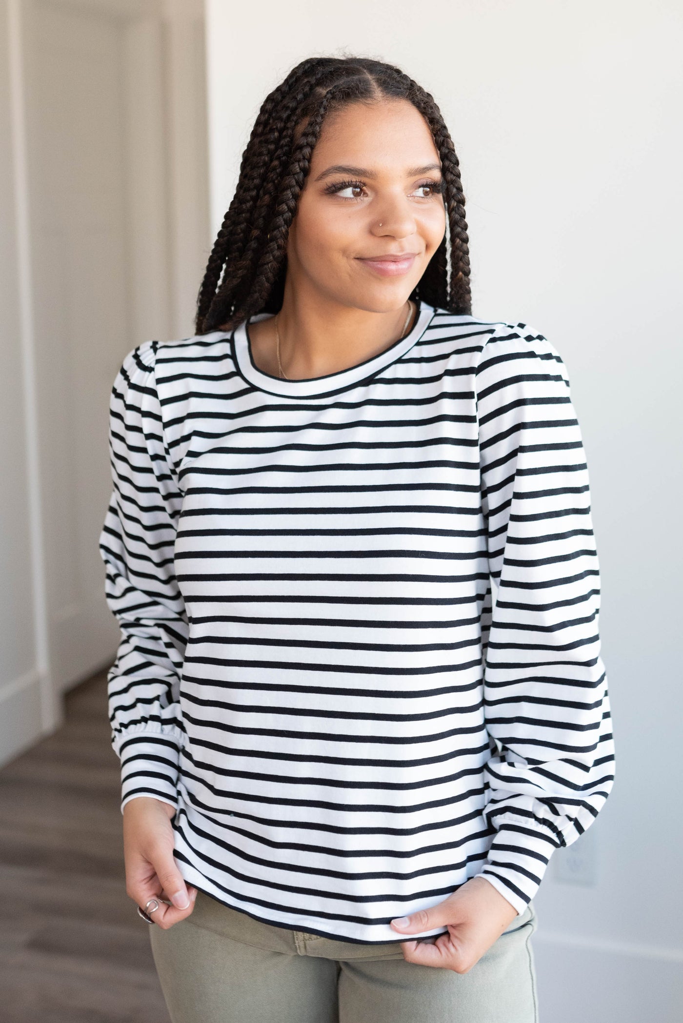 Gathered shoulders on the black stripe long sleeve top