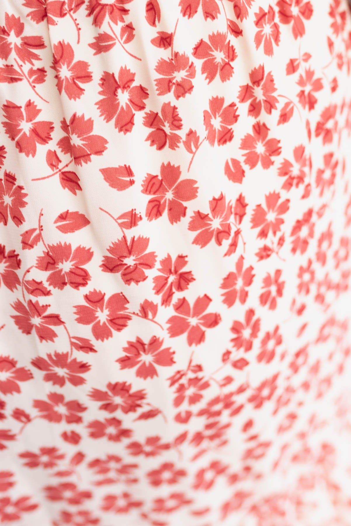 Close up of the fabric on the maroon floral skirt