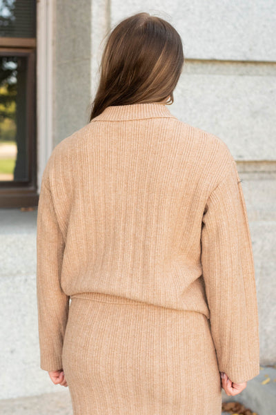 Back view of the camel ribbed sweater