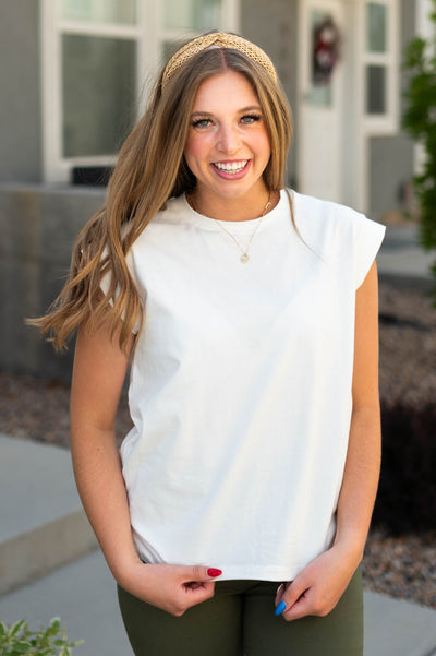 Knit white top with cap sleeves