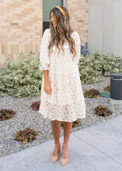 Below the knee cream floral dot dress