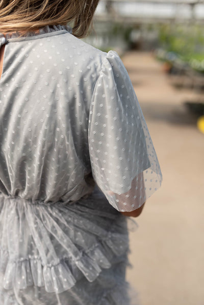 Close up of the fabric on the grey blue ruffle dress