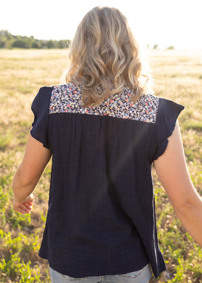 Back view of a navy top