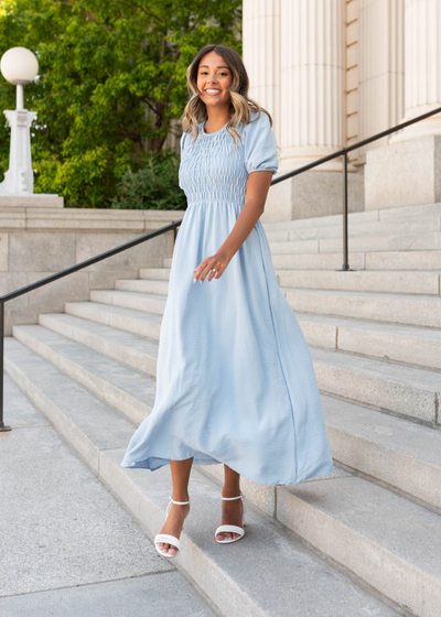 Blue smocked dress with short sleeves