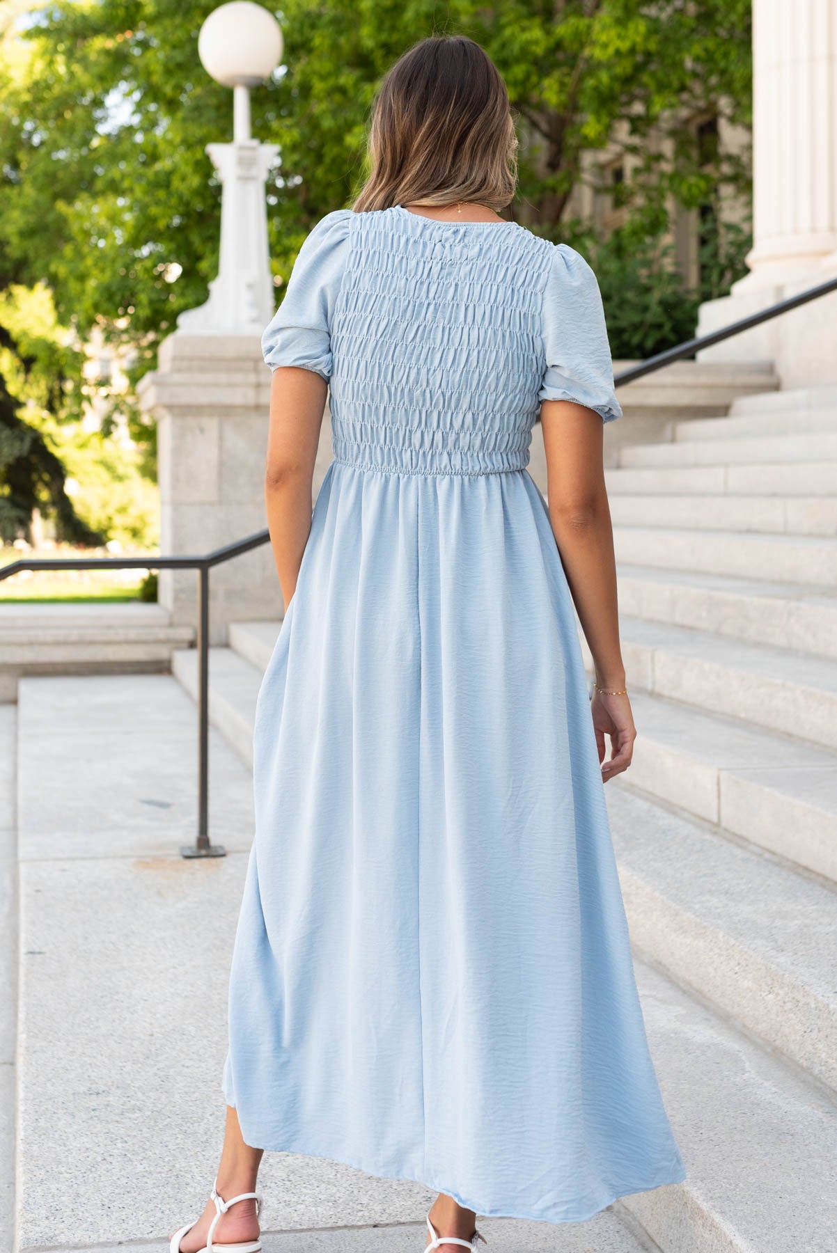 Back view of the blue smocked dress