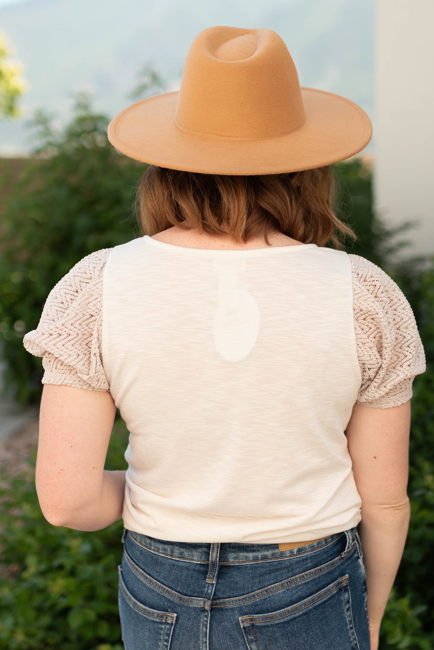 Back view of a ivory top