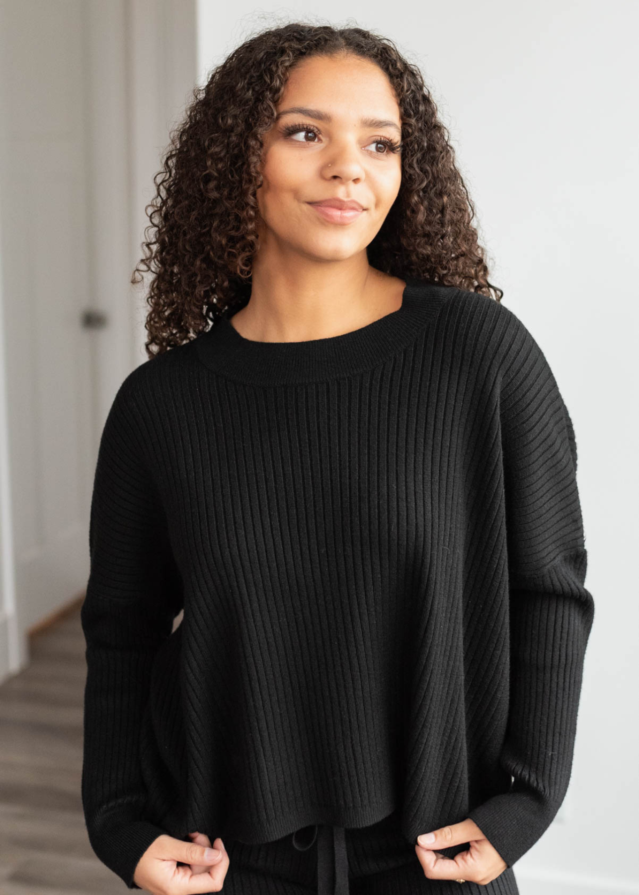 Black sweater with long sleeves