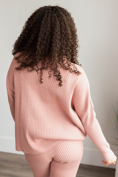 Back view of the blush sweater