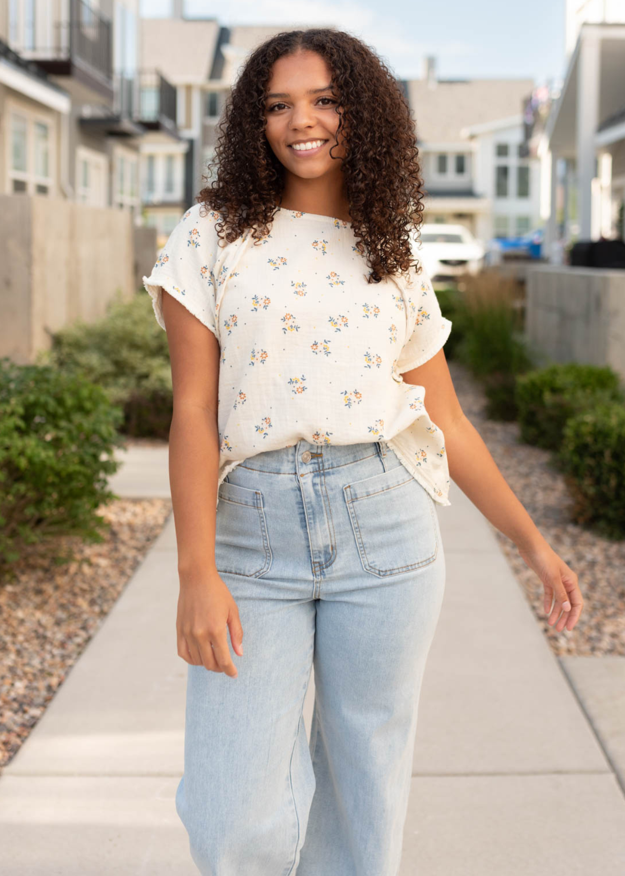 Beige floral top with short sleeves