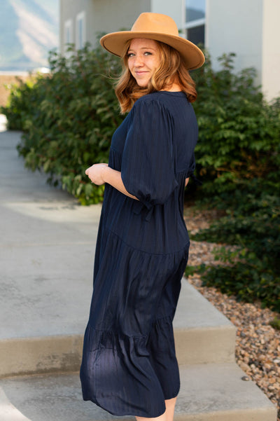 Side view of a navy dress