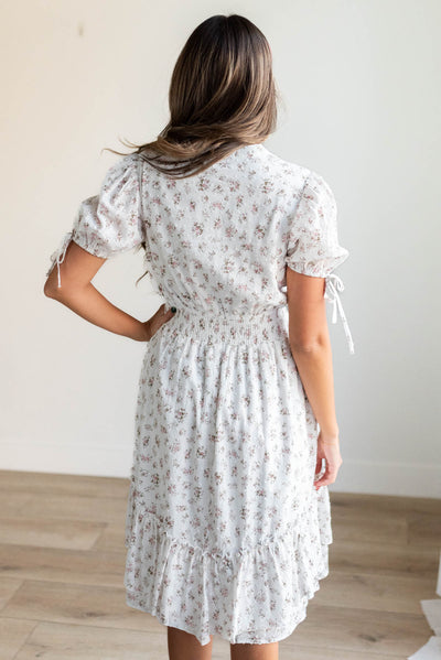 Back view of the ivory swiss dot floral dress