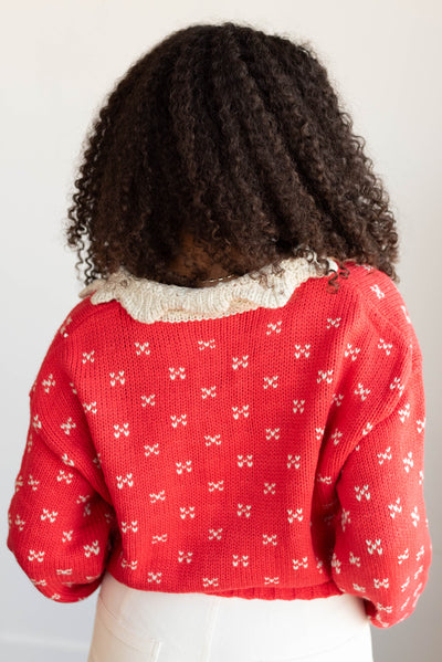 Back viewof the red collared sweater top