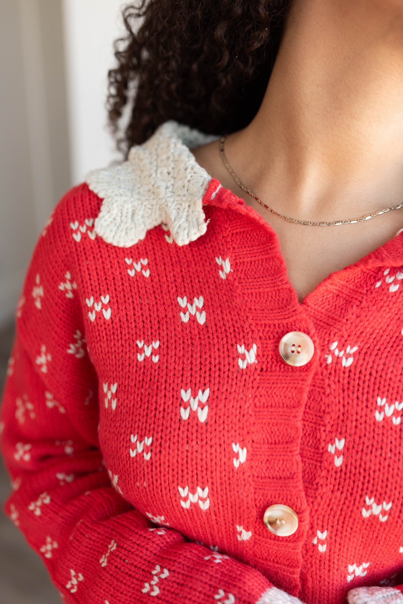 Red collared sweater top with ivory collar