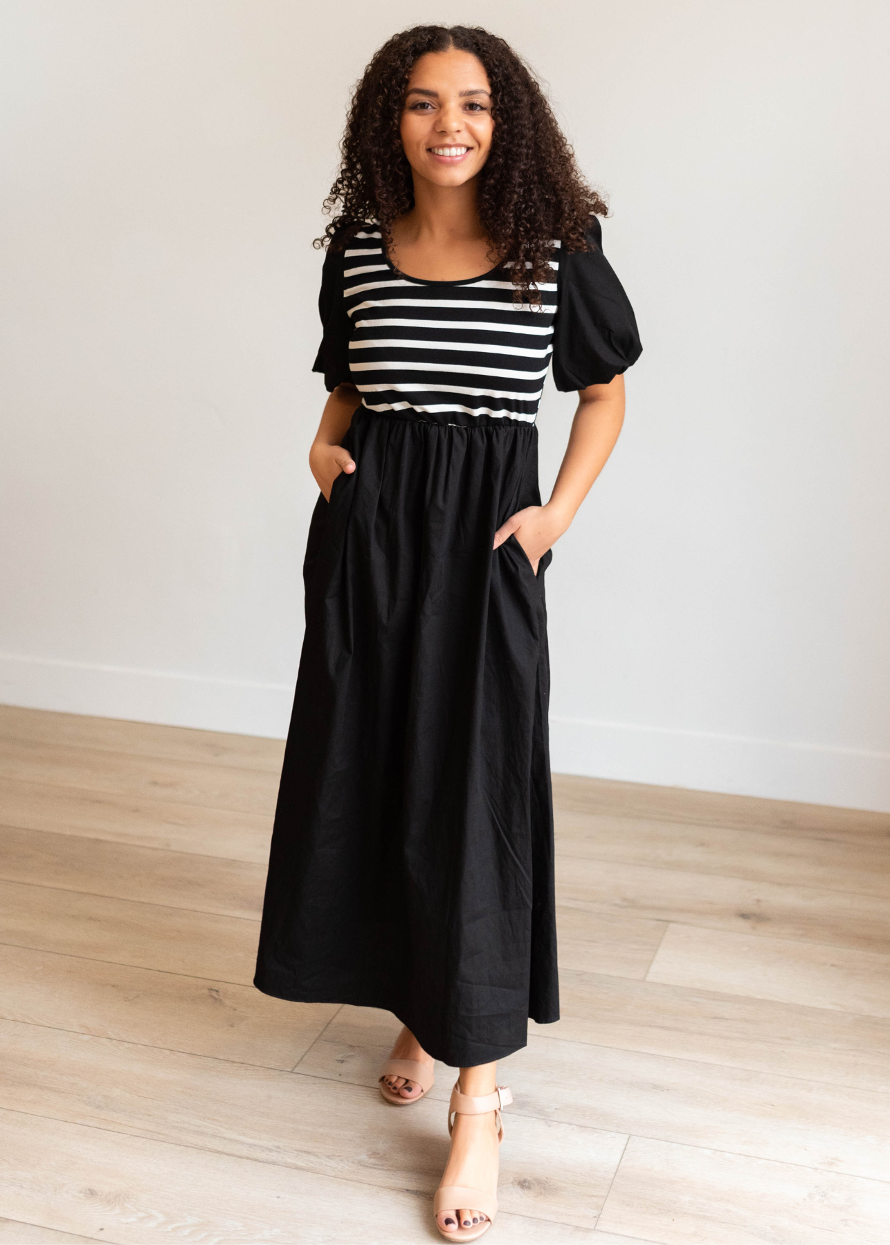 White and black stirpe bodice on the black stripe dress