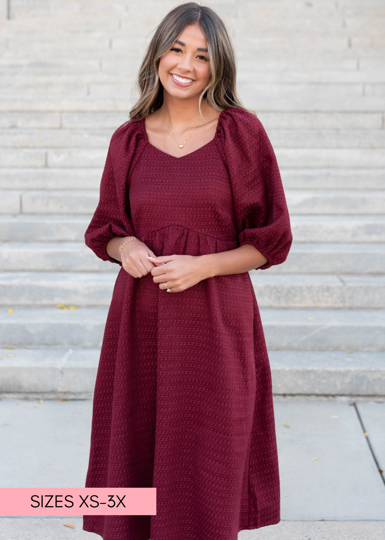 Burgundy textured dress with sweetheart neck and short sleeves