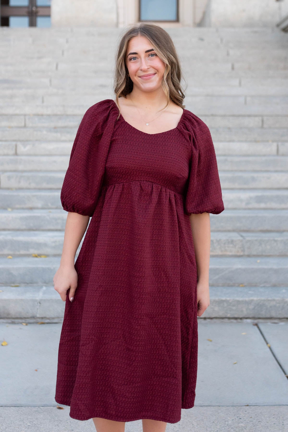 Burgundy textured dress in a medium