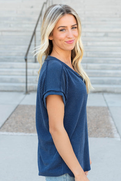 Side view of the navy ribbed top