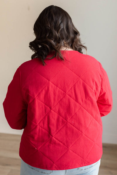 Back view of the plus size red quilted tie jacket