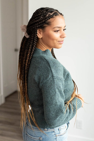 Side view of the ash jade button down cardigan