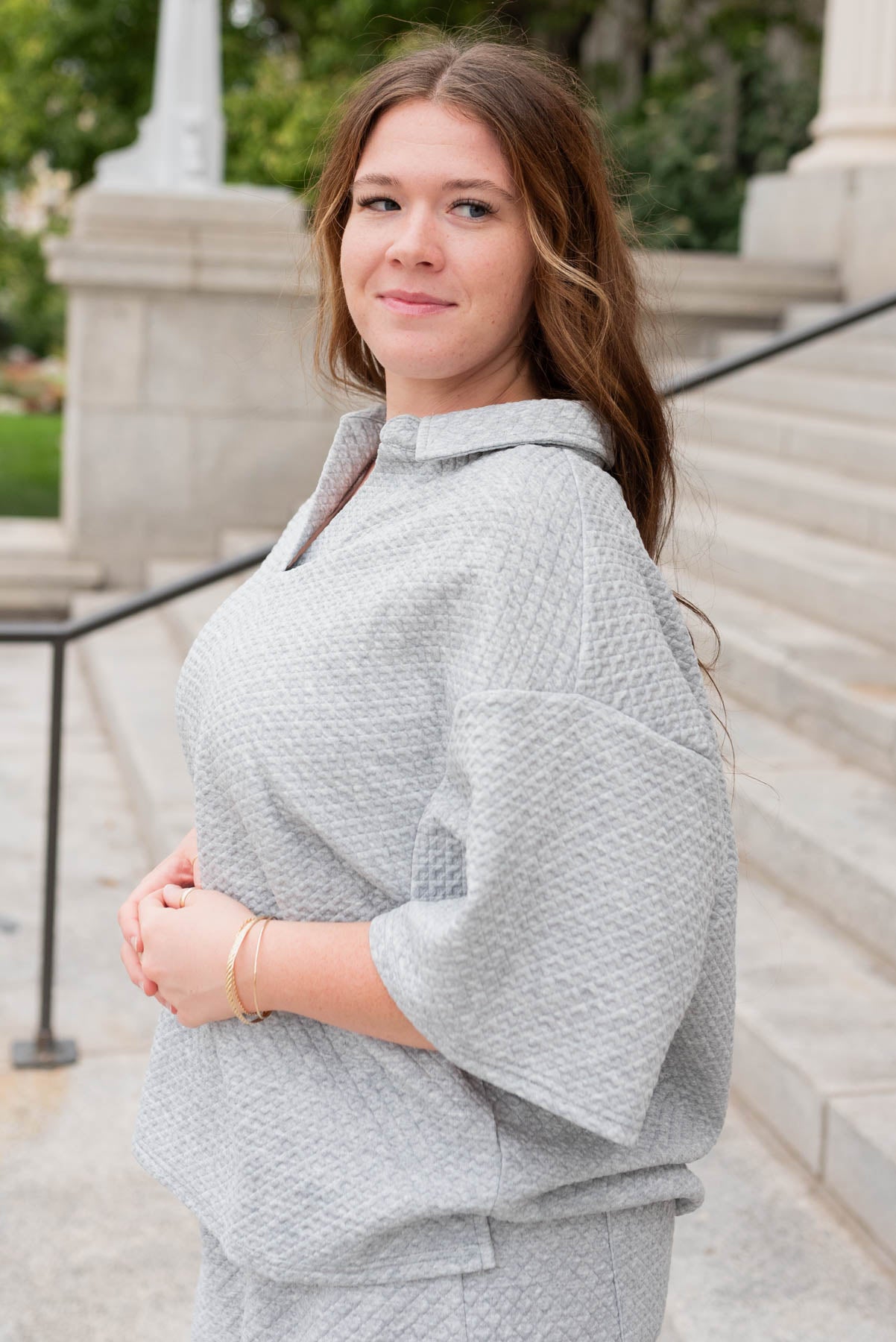 ide view of the heather grey collard knit top