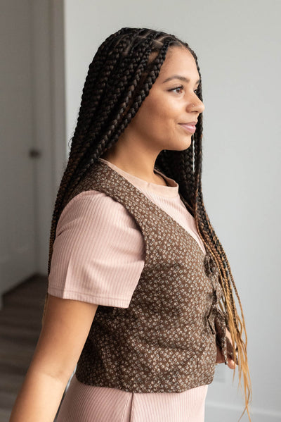 Side view of the dark mahogany vest