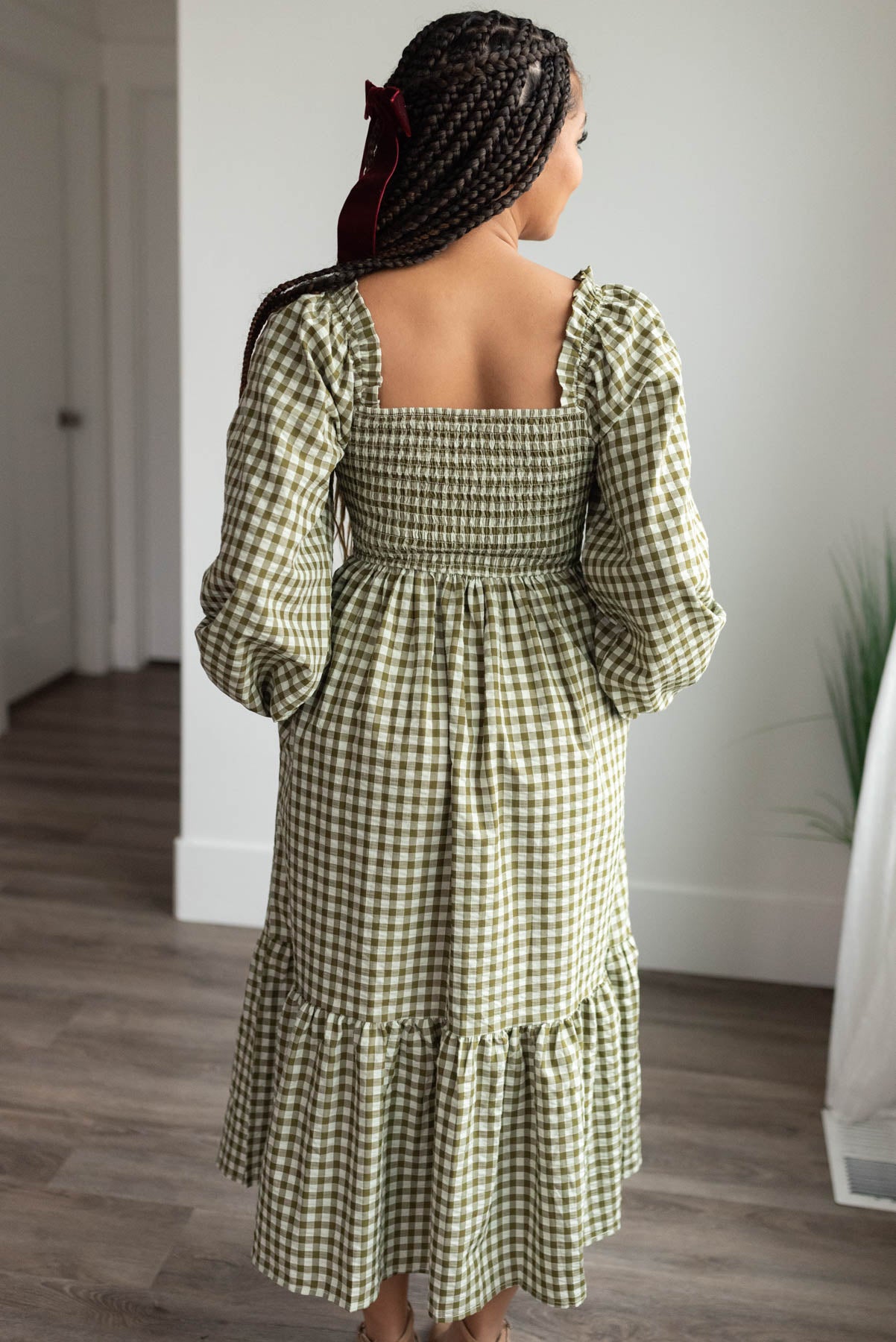 Back view of the olive gingham sqaure neck dress