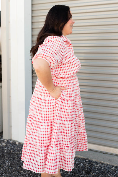 Side view of the plus size cherry plaid dress