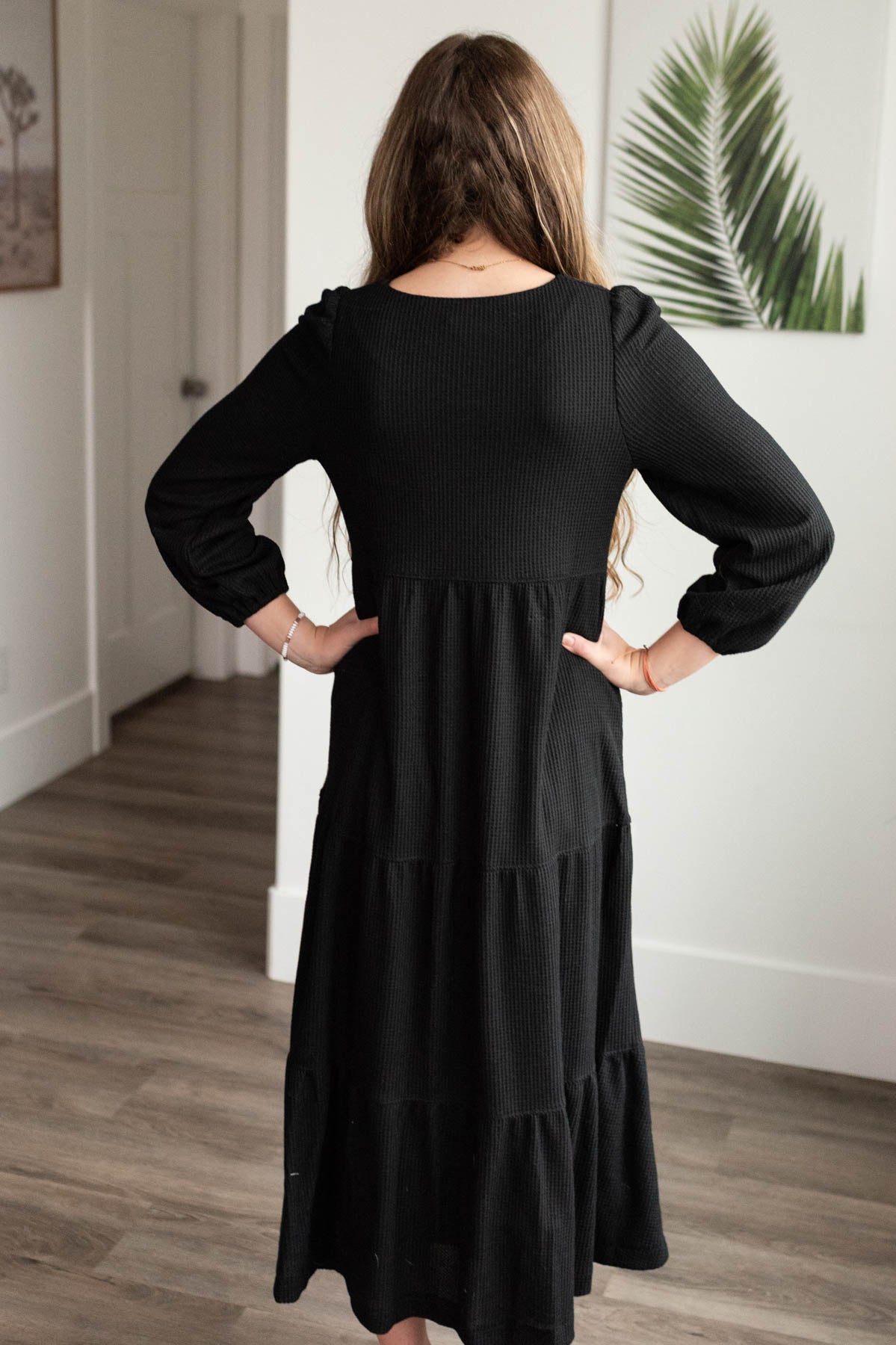 Back view of the black waffle knit dress